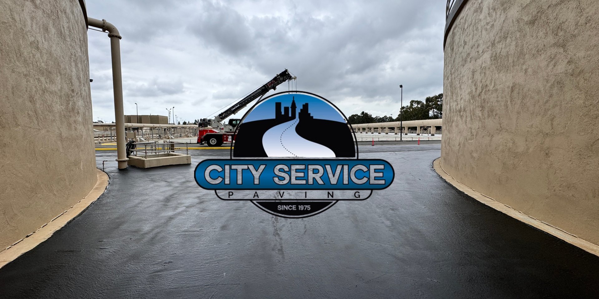 City Service Paving — freshly paved commercial site with the SoCal City Paving crew